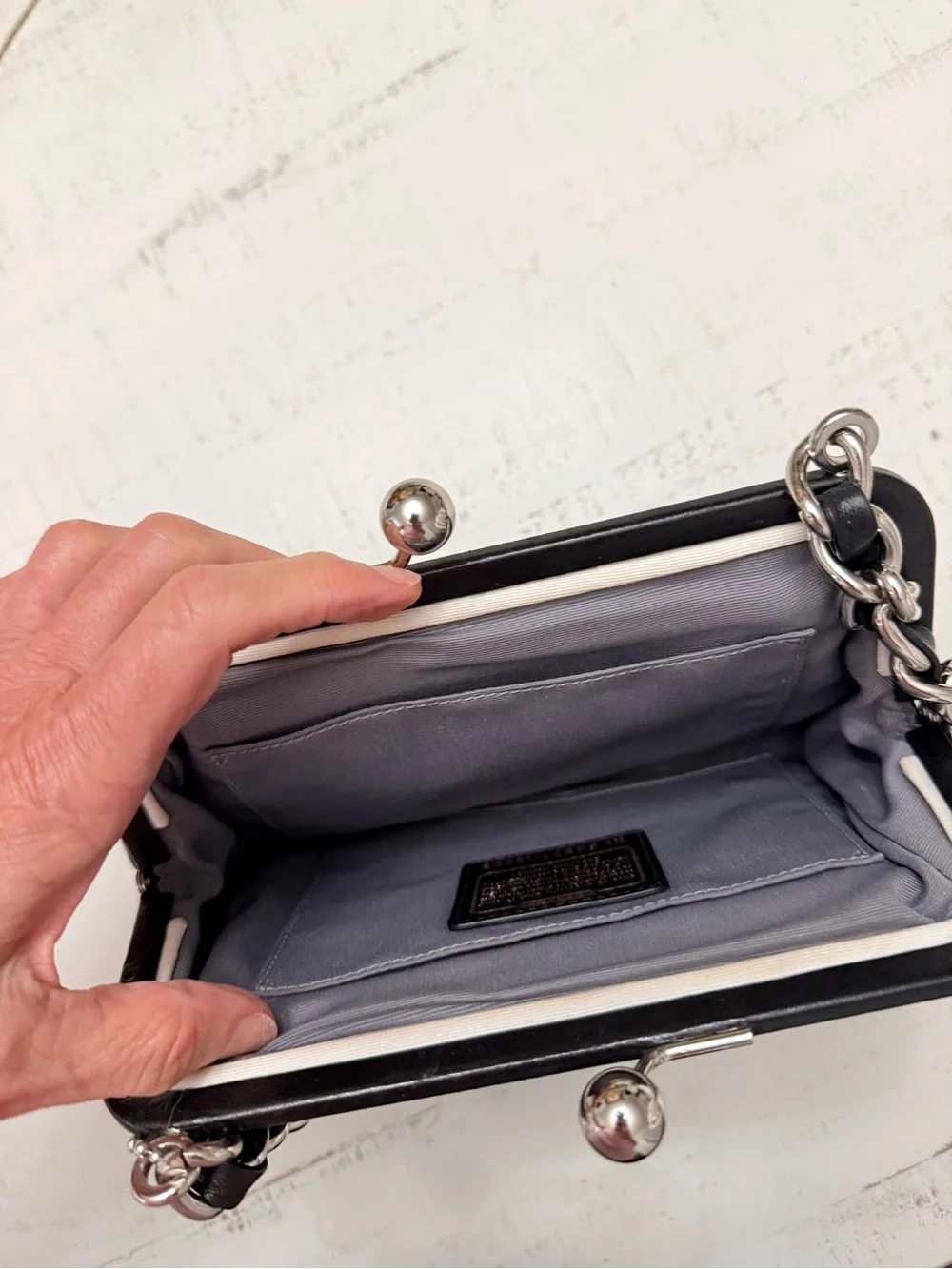 Coach compact shoulder